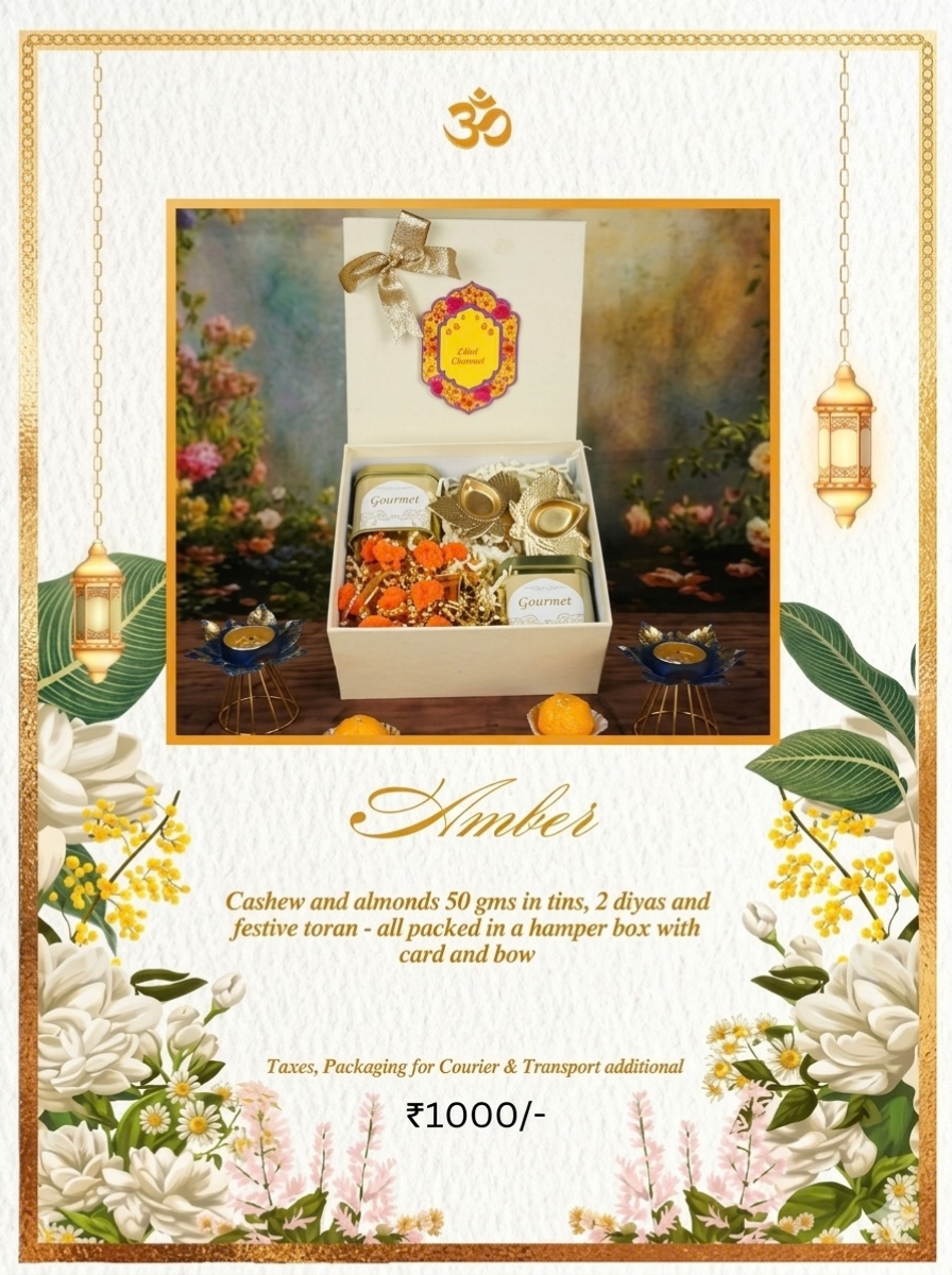 Amber Diwali hamper, ₹1,000. Cashew and almonds 50 g in tins, 2 diyas and a festive toran, in a hamper box with card and bow.